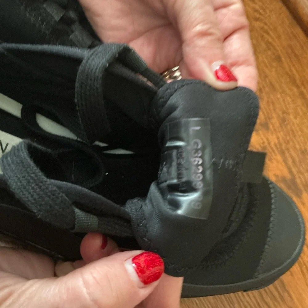 CHANEL Black Women’s Sneakers with Gold Logo